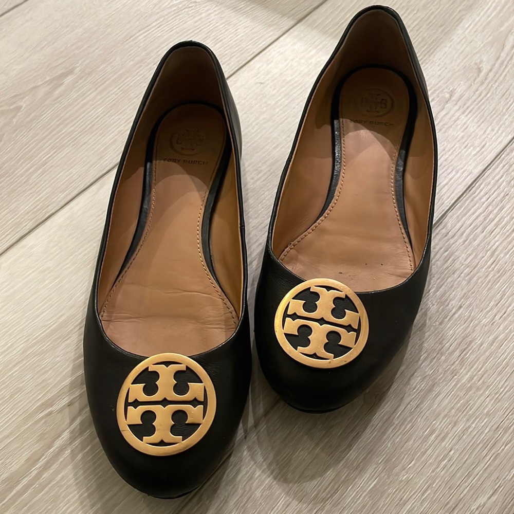 Black Tory Burch Minnie flats with gold hardware